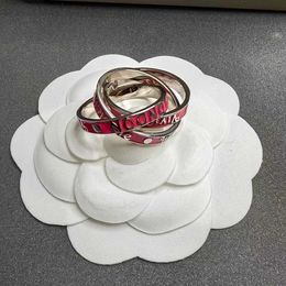 Brand High version Westwoods enamel three ring rose red Saturn wrapped waist activity folding Nail