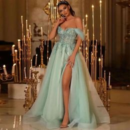 2024 Sexy Green Tulle Dresses Off the Shoulder Lace Appliques Crystal Beads Illusion Evening Dress Ball Gown Side Split Prom Gowns Floor Length 0513