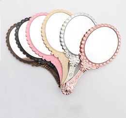 Ladies Vintage Repousse Floral Hand Held Oval Mirrors Household Sundries Makeup Dresser Romantic Lace Handheld Mirror Bronze Silv6049015