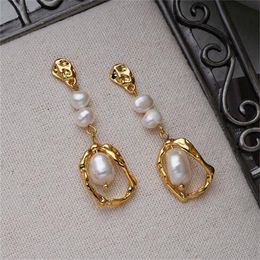 Natural pearl earrings female temperament light luxury long studs silver needle retro ear accessories