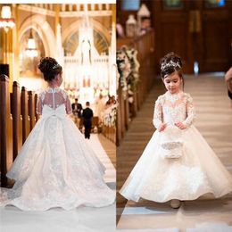 2020 Lovely Flower Girls Dresses For Weddings Princess Jewel Long Sleeves Lace Appliques Big Bow Sweep Train Little Kids Holy Pageant D 228e