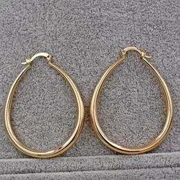20pcs/lot shine gold color women earringsファッションスムーズなフープイヤリング