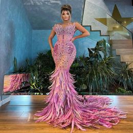 Pink Mermaid Prom Dresses Sleeveless V Neck 3D Lace Appliques Sequins Beaded Floor Length Celebrity Formal Feather Train Evening Dresse 2943