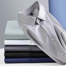 Men's Dress Shirts New elastic silk white shirt for mens long slved non ironing solid Colour casual slim fit business mens shirt Y240514