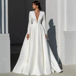 Backless Sexig Sheer A Line Wedding Dresses Deep V-ringen enkel vit elfenben Satin brudklänningar Långärmare Kvinnor Formell festevenemangsklänning