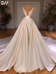 Romantiska V-ringade bröllopsapplikationer Kristaller a-line brudklänning elegant golvlängd brudklänningar vestidos de novia
