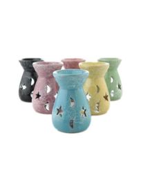 Creative aromatherapy stove Ceramic Oil Lamps Hollow Stars Moon Pattern Essential Oil Fragrance Candle Incense Burners DB5344177740