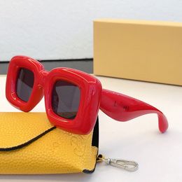 Fashion mens and womens oversized box sunglasses designed by a designer with a thick frame decoration mirror and original packaging box LW40098I