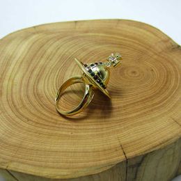 Brand Westwoods gold and silver openable three-dimensional Saturn ring -8027 Nail