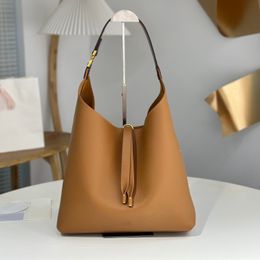 10A Designer Bag Vintage Hardware and Tassel Pendant Clean Lines and Soft Casual Silhouette Women's Hobo Handbag