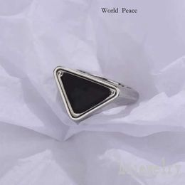 Praddas Collection Triangle Designer Ring Winter Black Band Attract Attention Simple Bague Lady Vintage Silver Colour Womens Rings For Men Enamels Letter P 103