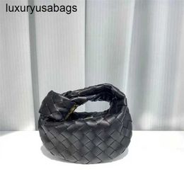 Jodie Handbag Bottegvenets Bags 2024 Italy Jodie Handbag Springsummer New Mini Knitted Cowhide Fashion Versatile Concave Shape Large Capacity Handheld Wome