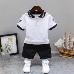 Clothing Sets Baby boy summer clothing set Korean fashion lapel T-shirt top and shorts two pieces of baby clothing childrens track and field clothing d240514