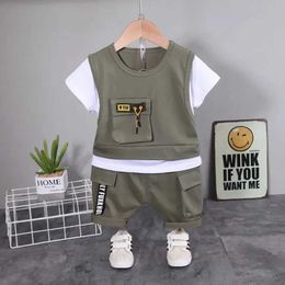 Clothing Sets New childrens cotton summer clothing childrens patch work T-shirt and shorts 2 pieces/set baby and toddler track and field clothing 0-5 years old d240514