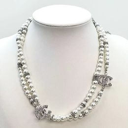 Moda 18k złota luksusowa marka projektant retro wisiorki naszyjniki krystaliczne perły list Choker wisiork naszyjnik