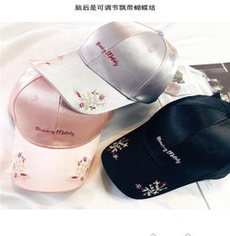 2021 Hat womens all match pink embroidery flower baseball cap student bow tie peaked caps spring and summer mens sunshade hats who4882124