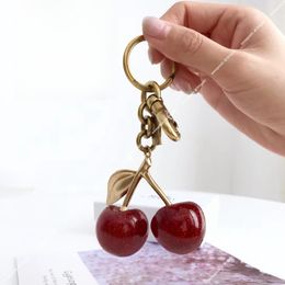 Cute Cherry Keychain Bag Charm Decoration Accessory Red Pink Crystal Cherry Pendant Decor gold Green Leaf High Quality Women Men Luxury Designer Apple Key Chain Gift