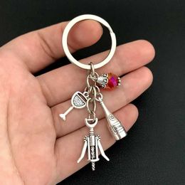 Keychains Lanyards 1pc Red Wine Glass Charm Keychain Cheers Jewellery GIfts For Wine Lover Wine Bottle Opener Charm Red Beads Keyring Y240510