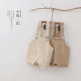 Overalls Casual baby boy solid denim top with 2 pockets design toddler jeans suspension pants baby girl jumpsuit Korean childrens clothing d240515