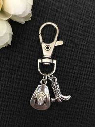 Keychains Lanyards 2018/fashion hot models high quality antique silver cowboy boots and cowboy hats keychains for men and womens waist. Y240510
