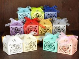 100Pcsset Heart Laser Cut Hollow Carriage Baby Shower Favours Boxes Gifts Candy Boxes Favour Holders With Ribbon Wedding Party Supp6648904