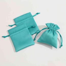 Jewelry Pouches, Bags 50Pcs Packaging Display Veet Dstring Bag Green Flannel Suede Chic Small Pouches Gift Packing Earrings Ring Neckl Dh2Gb