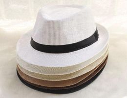 10pcslot 01806beixing Summer Solid Classic Paper Cap Men Women Fedoras Hat Whole Wide Brim Hats3893660