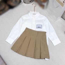 Top kids dress Two piece suits high quality child tracksuits Size 100-160 CM White long sleeved lapel shirt and Pleated skirt 24Mar