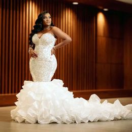 2024 Sexy Luxury African Mermaid Wedding Dresses Formal Bridal Dress Jewel Neck Illusion Crystal Beaded Plus Size Ruffles Tiered Cathedral Train Long Sleeves