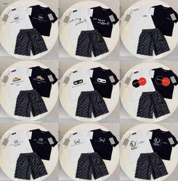 Top baby T-shirts suit summer kids tracksuits Size 100-150 round neck short sleeves and Letter logo printing shorts Jan20