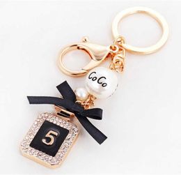 Brand Perfume Bottle Keychain Luxury Key Chain Fashion Key Ring Holder Keyrings Women Souvenirs Car Bag Charm Pendant G10196025180