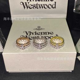 Brand Westwoods wears a double layered two in one ring. can split full diamond matching ring Nail