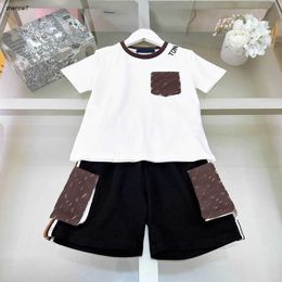 Top kids tracksuits Multi pocket child T-shirts suit Size 110-160 Flower logo print baby clothes boys Short sleeve and shorts Jan20