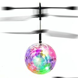 Party Favour Flying Rc Ball Aircraft Helicopter Led Flashing Light Up Toy Induction Electric Drone For Kid Children Drop Delivery Hom Dhe9Q