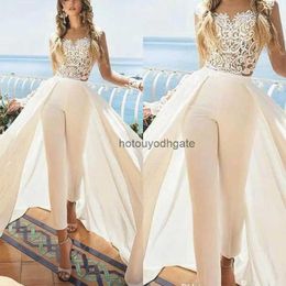 2023 Bride Jumpsuits Wedding Dresses Lace Appliques Illusion Long Sleeves Beach Bridal Gowns With Detachable Train Fitted Women Formal Wear
