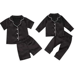 Pajamas 2020-09-09 Lioraitiin 1-7T toddler baby black satin pajamas baby boys short sleeved/long sleeved pants pajamas casual 2PCS pajamas d240515