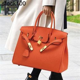 She Designer Handbags Cow Layer Platinum Yas First Leather Togo Leather Womens Large Capacity Handbag Temperament Lychee Pattern