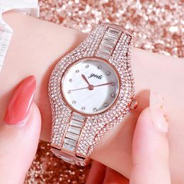 Armbanduhr Luxus Frauen Uhr Uhr 30m Wasserresistenz Diamanten Rose Gold Fashion Ladies Quarz Armband Uhr Frau Bling Accessoires