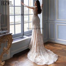 Luxury Crystal Beaded Lace Mermaid Wedding Gown Long Sleeve Sheer V-Neck Button Backless 2020 Wedding Dresses vestidos de novia