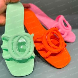Designer Sandaler Kvinnor Slästa glider gummi tofflor damer platt strand gelé manus orange sommar höst mulor utomhus vattentät lyxpool