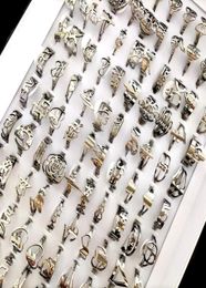100pcslot Random Mix band Laser Cut Stainless Steel Silver Rings Multidesign Top Mixed Women039s Smart Elegance Rings Wholesa553394791274