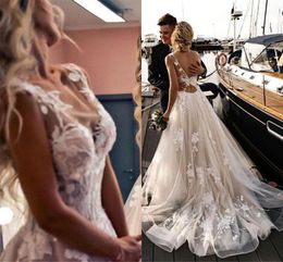 2024 Sexy A Line Wedding Dresses Summer Beach Boho Jewel Neck Sleeveless Lace Appliques Illusion Tulle Bridal Gowns wedding dress Open Back Sweep Train