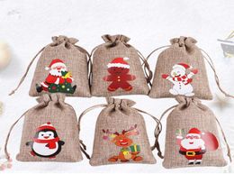 Christmas Burlap Linen Drawstring Bag Gift Wraps Santa Claus Snowman Penguin Elk Candy Jewelry Packaging Present Storage Bags Xmas4791152