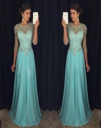 Chic Illusion Blue Prom Evening Dresses ALine Sheer Neck Rhinestones Major Beaded 34Long Sleeves Chiffon Formal Party Gown Celeb3820393