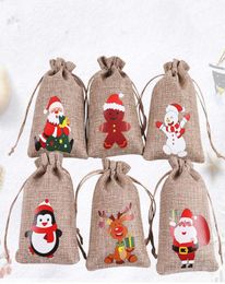Christmas Burlap Linen Drawstring Bag Gift Wraps Santa Claus Snowman Penguin Elk Candy Jewellery Packaging Present Storage Bags Xmas6481121