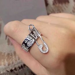 Brand New Arrival of Westwoods Saturn Pin Ring Personalized Punk Full Letter Printed Nail
