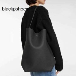 The Row TR Leather Best-quality Bags Luxurys Crossbody Designers Women Tote Bucket Half Moon Bag Crescent Underarm Shoulder Purse Ycvi H96d