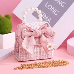 Backpacks Korean style girl princess bow messenger bag cute childrens fashion cross shaped bag girl coin wallet baby party wallet gift d240516