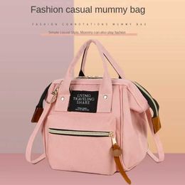 Diaper Bags Small size mother baby leather Pu bag mother storage double baby bag travel backpack diaper bag skin bag baby shoulder stroller Y240515