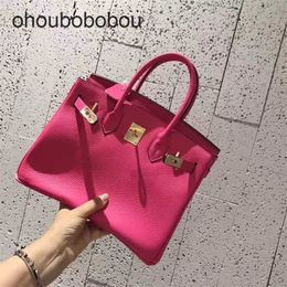 Handmade Handbag Red Luxurys Leather Handbag Rose Bag 2024 New Fashion Versatile Togo Litchi Pattern Bridal Bag Cy